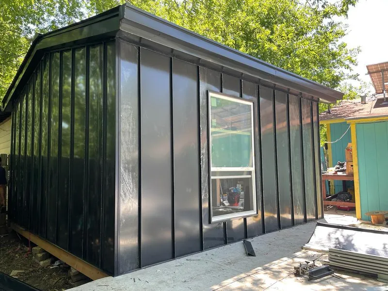 Black standing seam metal wall panels for Metal Roof Installation in Upton